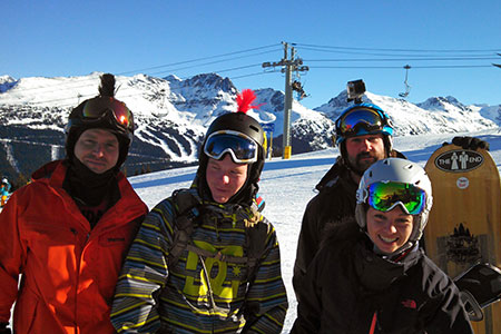 “Andrew and Erica with friends on the ski slopes